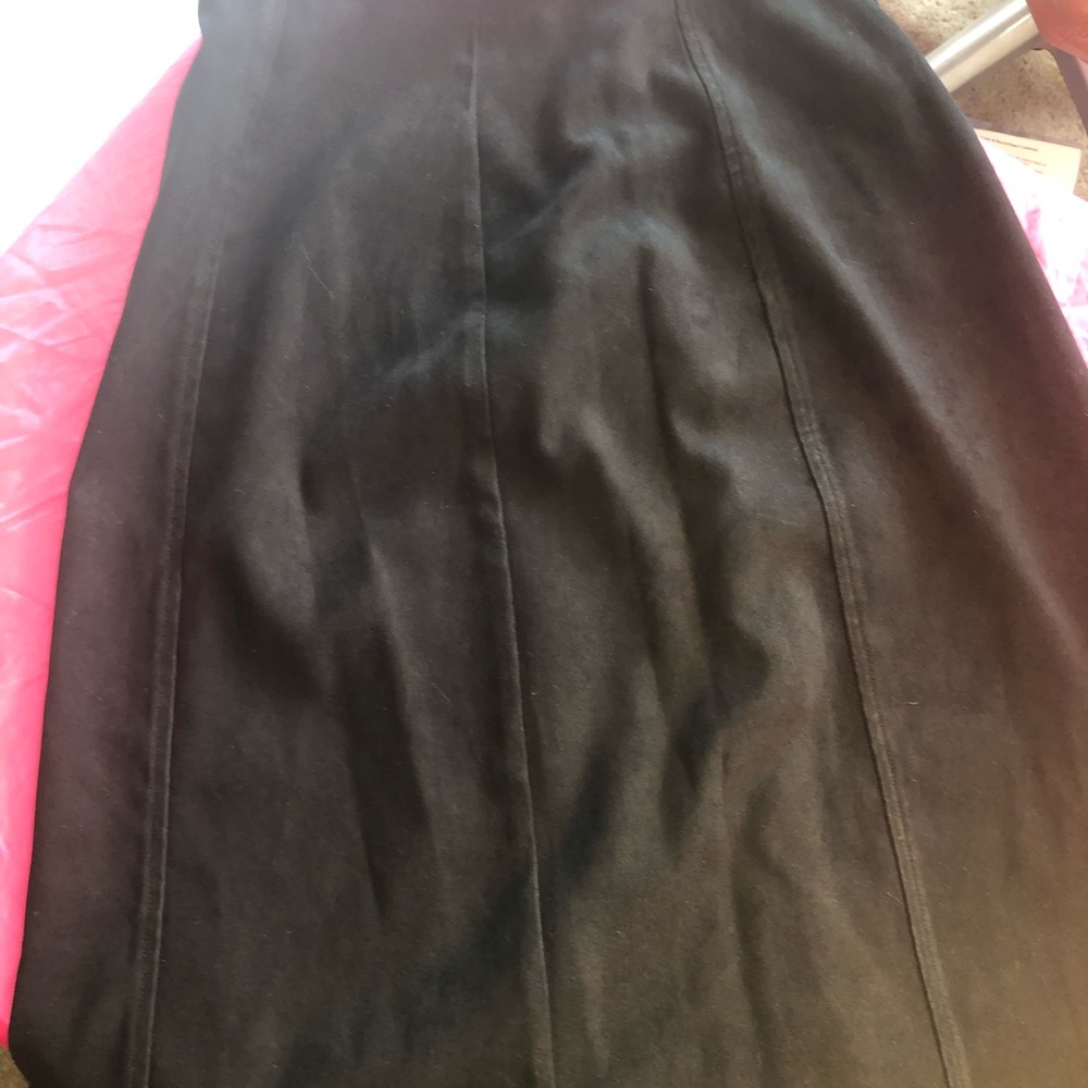 Woman’s long black skirt
